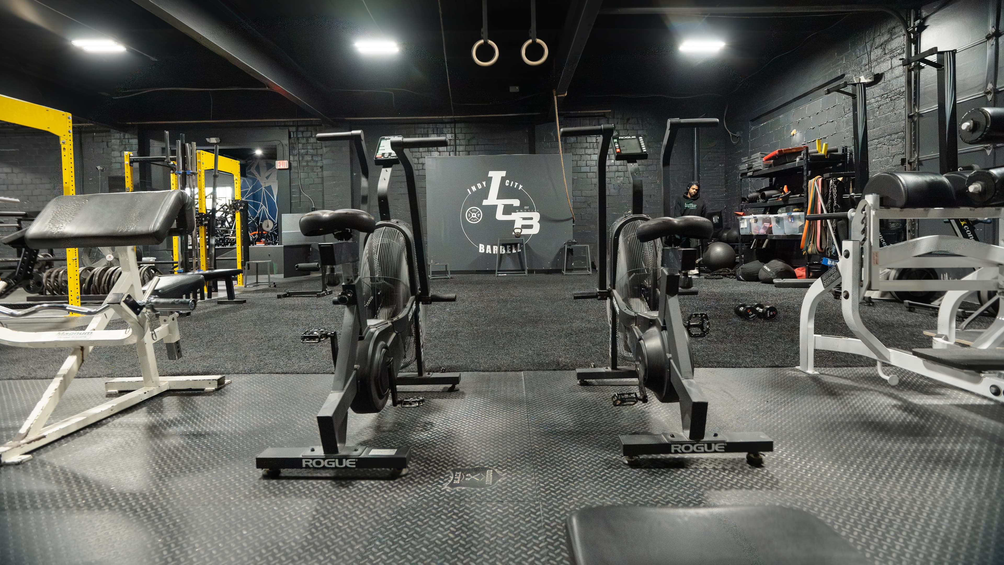 Cardio and conditioning equipment including assault bikes and rowers at Indy City Barbell
