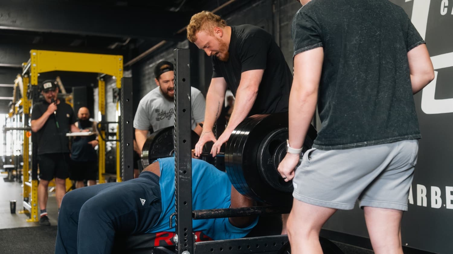 Powerlifter training on a competition rack at Indy City Barbell