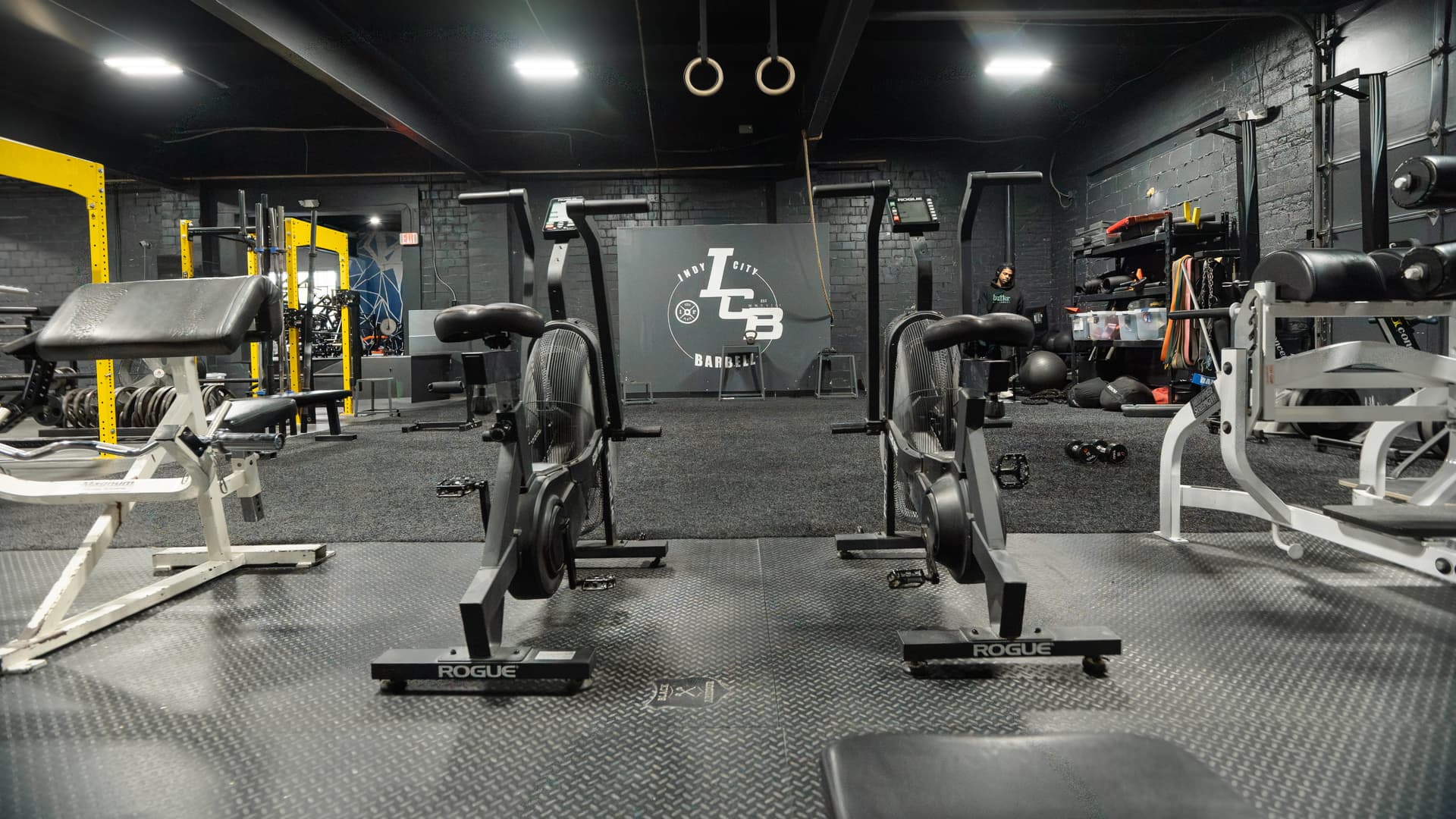 Cardio and conditioning equipment including assault bikes and rowers at Indy City Barbell
