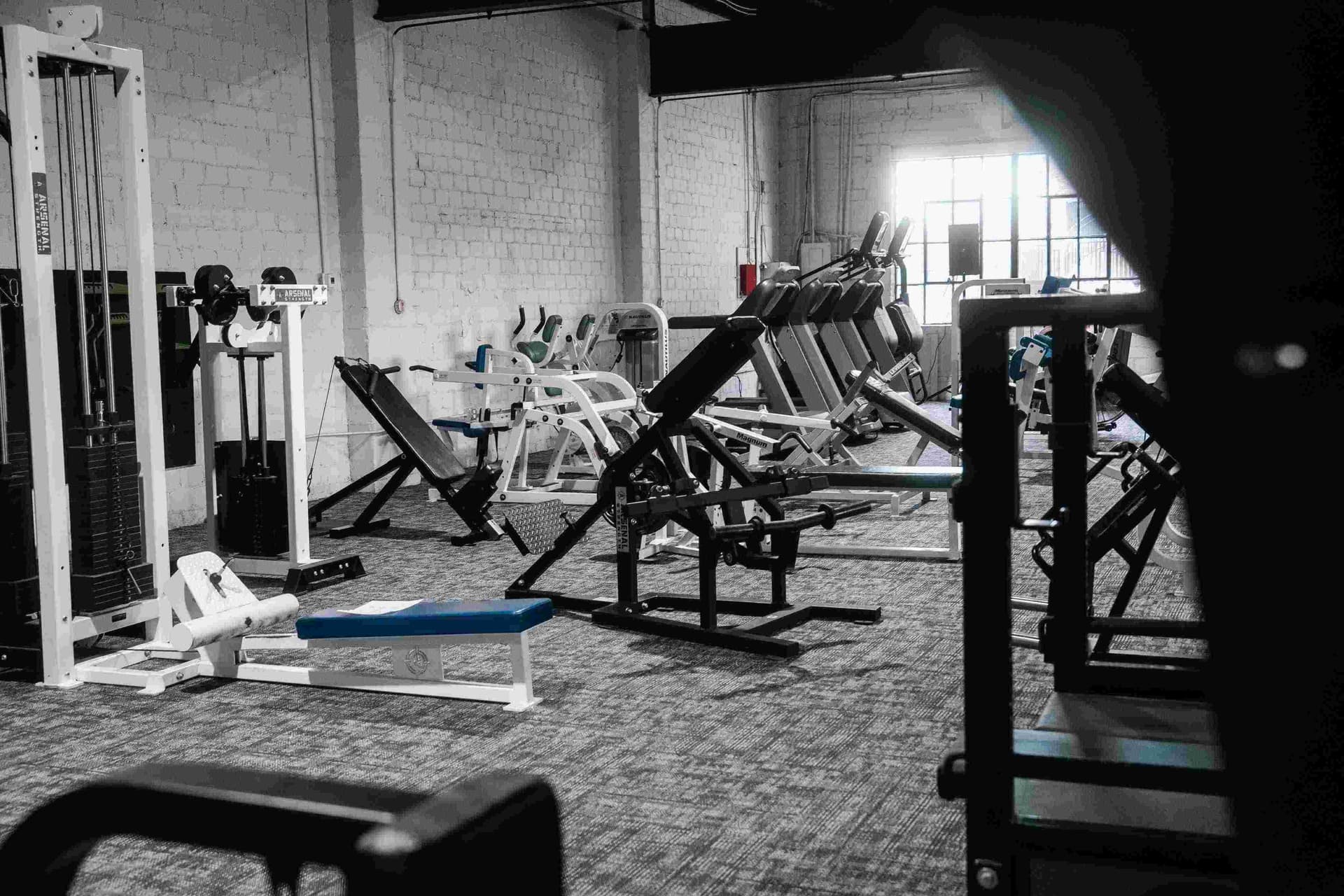 Power racks on the strength training floor at Indy City Barbell in Indianapolis